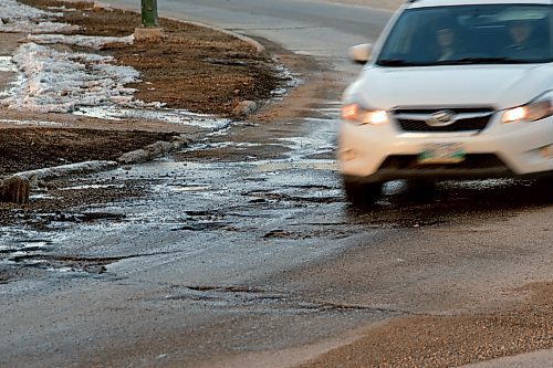 JOHN WOODS / WINNIPEG FREE PRESS
Car drivers avoid potholes on Academy at Wellington in Winnipeg Tuesday, March 28, 2023. 

Reporter: ?