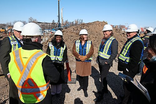 Health Minister Audrey Gordon, Manitoba Premier Heather Stefanson, Brandon Mayor Jeff Fawcett and Brandon-East MLA Len Isleifson share a laugh while getting a tour of construction for the expansion of the Brandon Regional Health Centre on Wednesday. (Tim Smith/The Brandon Sun)
