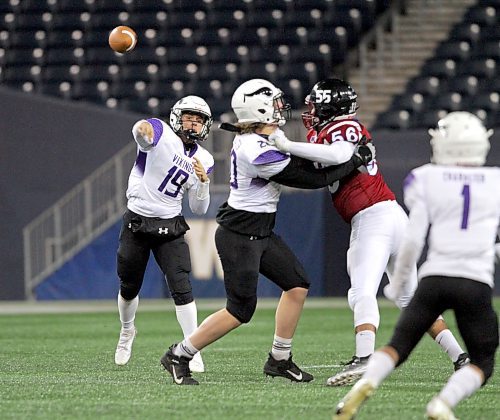 Vincent Massey Vikings quarterback Justin Sharp throws a pass during in the WHSFL Division 2 final at IG Field, home of the University of Manitoba Bisons in Winnipeg in November. He signed with the Bisons football team for the 2023 Canada West season on Tuesday. (Thomas Friesen/The Brandon Sun)