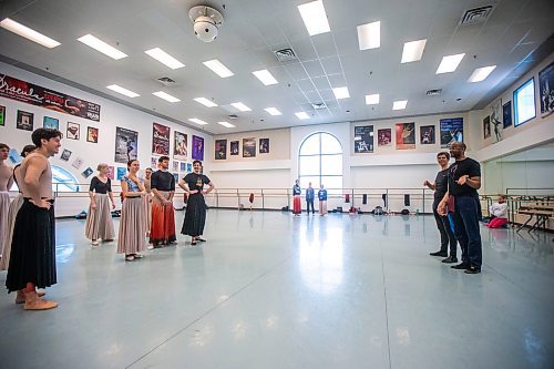 MIKAELA MACKENZIE / WINNIPEG FREE PRESS

Ballet master Jaime Vargas (left) and choreographer Meredith Rainey chat with dancers before rehearsing a piece for Fast Forward, a mixed-repetoire studio show, at the Royal Winnipeg Ballet in Winnipeg on Wednesday, March 22, 2023. 
For Jen story.

Winnipeg Free Press 2023.