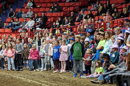 29032023
Children line the perimeter of the arena as the WoofJocks Canine All Stars' perform during the Royal Manitoba Winter Fair at Westoba Place on Wednesday. 
(Tim Smith/The Brandon Sun)
