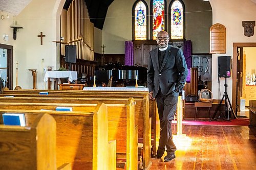 MIKAELA MACKENZIE / WINNIPEG FREE PRESS

Reverend Wilson Akinwale, chair of the Black Anglicans of Canada Dismantling Anti-Black Racism Committee in the Diocese of Rupert's Land, poses for a photo in his parish, St Thomas Anglican Church, in Winnipeg on Wednesday, March 29, 2023. For John Longhurst story.

Winnipeg Free Press 2023.