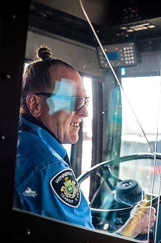 MIKAELA MACKENZIE / WINNIPEG FREE PRESS

Transit operator Joseph Fullmer drives and keeps a running commentary up for passengers on the 18 bus in Winnipeg on Thursday, March 23, 2023. For Dave story.

Winnipeg Free Press 2023.