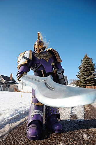 Randy Collen is suited up in his award-winning, homemade seven-foot-tall Warhammer cosplay armour at his Minnedosa home on March 29. (Tim Smith/The Brandon Sun)