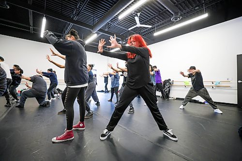 RUTH BONNEVILLE / WINNIPEG FREE PRESS 

ENT - Indigenous dance

Madi Ottertail  (red hair)  from Lac la Croix First Nation, rehearses with class Monday. 

Outside Looking In, an Indigenous-led youth social service organization, hosts rehearsals in Winnipeg for participants in its dance program at  Industria Dance Centre Monday. 

The group is made up of Indigenous youth from across the province, many from fly-in communities, who are learning choreography  in a hip-hop style dance that they&#x2019;ll perform at a major event in Toronto in May.

Eva Wasney's story. 

March 27th, 2023