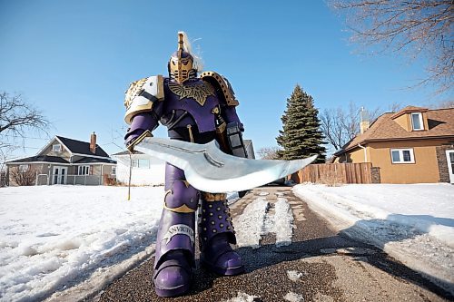 30032023
Randy Collen of Minnedosa in his award-winning and homemade seven-foot-tall Warhammer cosplay armour at his home on Wednesday. 
(Tim Smith/The Brandon Sun)
