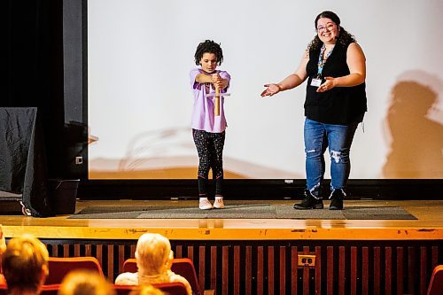 MIKAELA MACKENZIE / WINNIPEG FREE PRESS

Maryella Ventura, six, participates in Rhianna Cohen&#x573; science demonstration, H2WOAH!, as part of the special spring break activities at the Manitoba Museum in Winnipeg on Thursday, March 30, 2023.  Standup.

Winnipeg Free Press 2023.