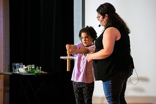 MIKAELA MACKENZIE / WINNIPEG FREE PRESS

Maryella Ventura, six, participates in Rhianna Cohen&#x573; science demonstration, H2WOAH!, as part of the special spring break activities at the Manitoba Museum in Winnipeg on Thursday, March 30, 2023.  Standup.

Winnipeg Free Press 2023.