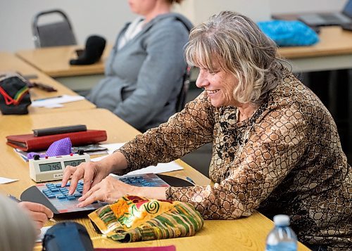 Mike Sudoma/Winnipeg Free Press
Jackie Rittberg constructs a word on her board during a weekly Winnipeg Scrabble Club meetup at the Canadian Mennonite University Thursday evening
March 30, 2023 