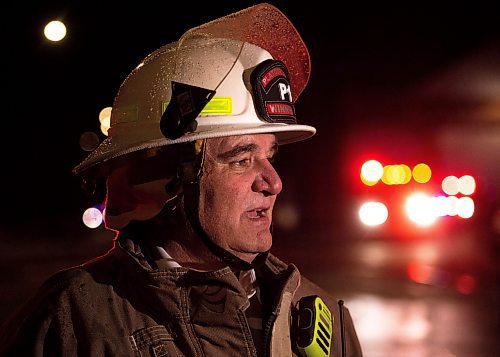 Mike Sudoma/Winnipeg Free Press
WFPS Platoon Chief Don Enns talks to media regarding a large warehouse fire on Sutherland Avenue Thursday evening. No injuries were reported and the building is reported to be a total loss
March 30, 2023 