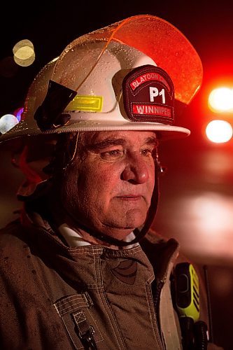 Mike Sudoma/Winnipeg Free Press
WFPS Platoon Chief Don Enns talks to media regarding a large warehouse fire on Sutherland Avenue Thursday evening. No injuries were reported and the building is reported to be a total loss
March 30, 2023 