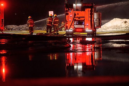 Mike Sudoma/Winnipeg Free Press
Fire crews work to extinguish a large warehouse fire on Sutherland Avenue, beside the Louise bridge Thursday evening
March 30, 2023 