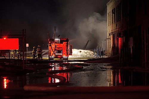 Mike Sudoma/Winnipeg Free Press
Fire crews work to extinguish a large warehouse fire on Sutherland Avenue, beside the Louise bridge Thursday evening
March 30, 2023 