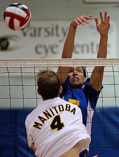 Shaun Funk, shown blocking a Manitoba Bison in 2008, spent four years with the Brandon University Bobcats men's volleyball team. (Tim Smith/The Brandon Sun)