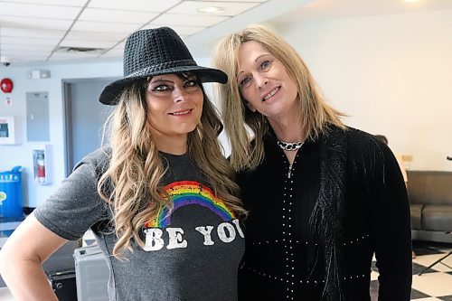 Anastasia Jane Gibson and Wendy Friesen pose for a photo at Brandon University's Knowles-Douglas Student Union Centre on Friday afternoon. The couple were scheduled to perform music and some spoken-word poetry at the Lady of the Lake restaurant later that evening for the International Transgender Day of Visibility. (Kyle Darbyson/The Brandon Sun)