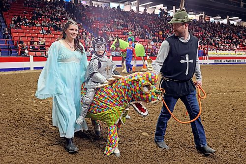 Vicky and Kyle Conrad, their son Canaan and their miniature horse Willow compete  in the Tim Horton’s Costume Class event at the Royal Manitoba Winter Fair in Westoba Place on Friday evening. (Tim Smith/The Brandon Sun)
