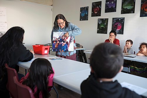 30032023
Julia Brandon of Wawezhiicabbo Wing shows students a photo from when she attended residential school while teaching her weekly Anishinaabemowin language class at the Brandon Friendship Centre on Friday. The two-hour class each Friday afternoon is part of the Sixties Scoop Reclaim and Reconnect program.
(Tim Smith/The Brandon Sun)

