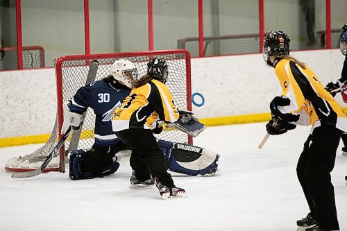 BROOK JONES / WINNIPEG FREE PRESS
Team Manitoba forward Kailey Rouire takes a shot on Team Alberta goaltender Aidan Coates during the 2023 Western Canadian Ringette Championships at the Seven Oaks Arena in Winnipeg, Man., Saturday, April 1, 2023. Team Manitoba earned the bronze medal despite a 6-5 loss in overtime to Team Alberta. Cllose to 500 ringette players from 25 teams from the western Canadian provinces competed at the championships, which ran March 29 to April 1. 