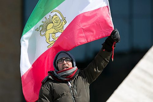 BROOK JONES / WINNIPEG FREE PRESS
Sohrab Khoshkebari waves an Iranian flag as he joins members of the Iranian community and their supports to protest Iran's regime. The group of protesters gathered in front of the Canadian Museum for Human Rights in Winnipeg, Man., Saturday, April 1, 2023. 