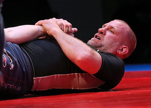 Joe Doerksen sinks in an armbar on Logan McDonald at Brandon Bouts. (Perry Bergson/The Brandon Sun)