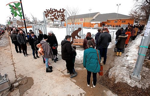 JOHN WOODS / WINNIPEG FREE PRESS
People line up around the block to get into the inaugural Winnipeg Punk Rock Flea Market in Valour Community Centre Sunday, April 2, 2023. 

Re: ?