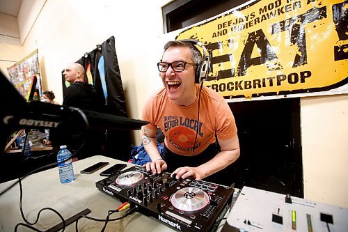 JOHN WOODS / WINNIPEG FREE PRESS
Marty &quot;Mod Marty&quot; Emanuel of The Beat - Alt Rock Brit Pop has a good time as he spins some punk tunes at the inaugural Winnipeg Punk Rock Flea Market in Valour Community Centre Sunday, April 2, 2023. 

Re: ?