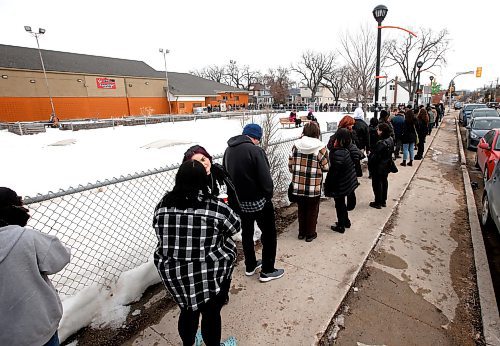 JOHN WOODS / WINNIPEG FREE PRESS
People line up around the block to get into the inaugural Winnipeg Punk Rock Flea Market in Valour Community Centre Sunday, April 2, 2023. 

Re: ?