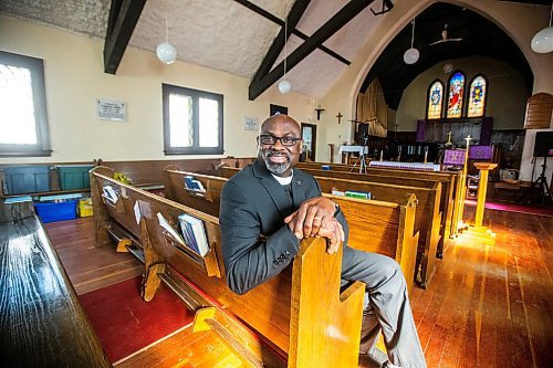 MIKAELA MACKENZIE / WINNIPEG FREE PRESS

Reverend Wilson Akinwale, chair of the Black Anglicans of Canada Dismantling Anti-Black Racism Committee in the Diocese of Rupert's Land, poses for a photo in his parish, St Thomas Anglican Church, in Winnipeg on Wednesday, March 29, 2023. For John Longhurst story.

Winnipeg Free Press 2023.