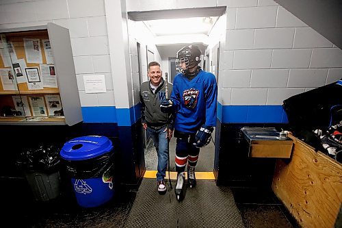 JOHN WOODS / WINNIPEG FREE PRESS
Hockey dad and former Winnipeg mayor Brian Bowman walks to the rink with his son before his hockey practice at River Heights C.C. Monday, April 3, 2023. 

Re: