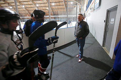 JOHN WOODS / WINNIPEG FREE PRESS
Hockey dad and former Winnipeg mayor Brian Bowman talks to his son as he comes off the ice from his hockey practice at River Heights C.C. Monday, April 3, 2023. 

Re: