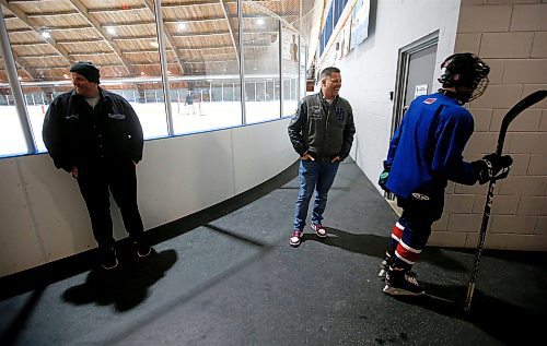 JOHN WOODS / WINNIPEG FREE PRESS
Hockey dad and former Winnipeg mayor Brian Bowman talks to his son as he comes off the ice from his hockey practice at River Heights C.C. Monday, April 3, 2023. 

Re: