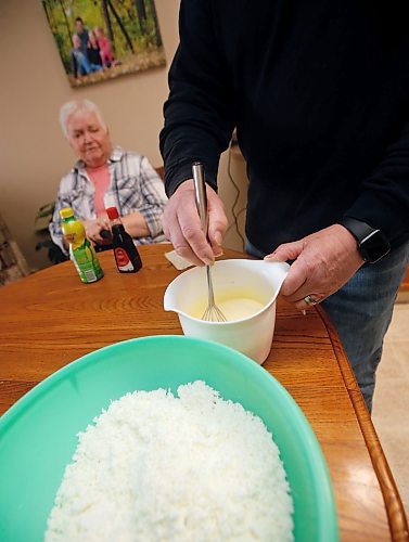 JOHN WOODS / WINNIPEG FREE PRESS
Elvera Kirk, her son Lee and her grandson Chris, make an old family recipe for Glumz Paska, a sweet cheese spread put on paska bread at Easter, in her apartment Monday, April 3, 2023. 

Re: wazney