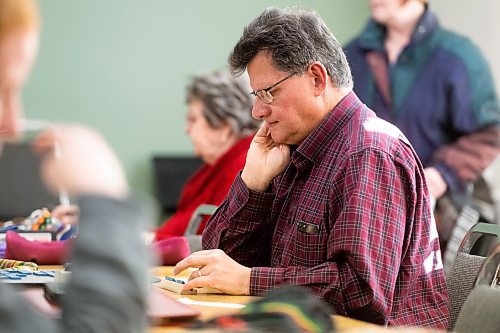 Mike Sudoma / Winnipeg Free Press 
Blair Rutter ponders his options before making a play at a Winnipeg Scrabble Club meetup recently.