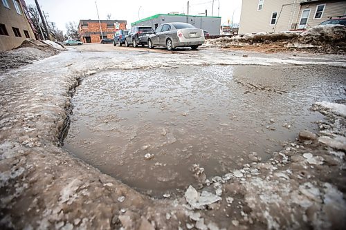 MIKAELA MACKENZIE / WINNIPEG FREE PRESS

A massive crater in the road on Gordon Avenue near Henderson Highway in Winnipeg on Tuesday, April 4, 2023. For Malak story.

Winnipeg Free Press 2023.