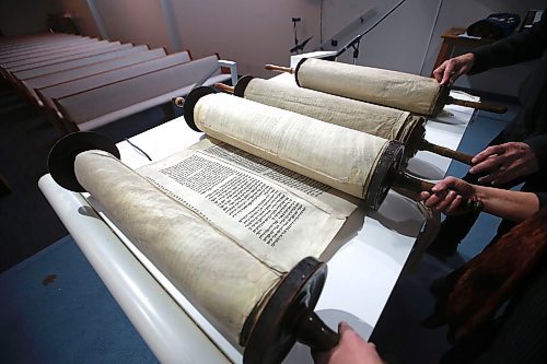 JOHN WOODS / WINNIPEG FREE PRESS
Rabbi Allan Finkel and Dr Rena Sector Elbaze show two Torah scrolls saved from Czech Republic, formely part of Czechoslovakia, which were saved during World War 2 at Temple Shalom Tuesday, April 4, 2023. 

Re: suderman