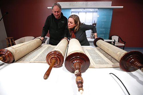 JOHN WOODS / WINNIPEG FREE PRESS
Rabbi Allan Finkel and Dr Rena Sector Elbaze show two Torah scrolls saved from Czech Republic, formely part of Czechoslovakia, which were saved during World War 2 at Temple Shalom Tuesday, April 4, 2023. 

Re: suderman