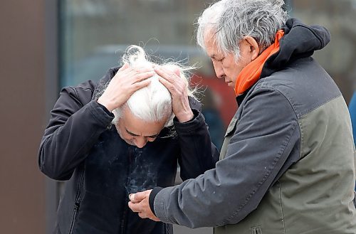 JOHN WOODS / WINNIPEG FREE PRESS
A person smudges as people gather to remember Linda Mary Beardy whose body was found in Brady Landfill Tuesday, April 4, 2023. 

Re: May