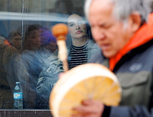 JOHN WOODS / WINNIPEG FREE PRESS
Anna Huard, MMIWG liaison for Southern Chiefs Organization looks on as elder Chris Young drums as people gather to remember Linda Mary Beardy whose body was found in Brady Landfill Tuesday, April 4, 2023. 

Re: May