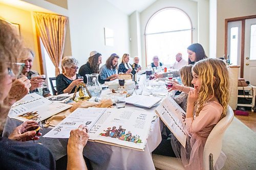 MIKAELA MACKENZIE / WINNIPEG FREE PRESS

Emmy Bowyer (seven) lifts her glass at a Seder dinner marking the start of Passover in the Chodirker household in Winnipeg on Wednesday, April 5, 2023. Standup.

Winnipeg Free Press 2023.