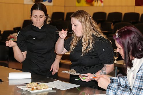 Assiniboine Community College alumni Beth Butterfield and Casey Naherniak judge pork appetizers alongside ACC instructor Joanne Johnston during Thursday's Manitoba Pork Black Box Competition, which took place at the Manitoba Institute of Culinary Arts. (Kyle Darbyson/The Brandon Sun)