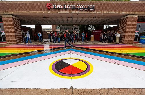 MIKE DEAL / WINNIPEG FREE PRESS
On the first day of classes for the fall semester, RRC Polytech unveiled its first Rainbow Walkway at the main entrance of its Notre Dame Campus. The Rainbow Walkway features a 14 by 7-metre (approximately 45 by 22.5-feet) painting of a new Pride design that includes representation for all 2SLGBTQIA+ (Two-Spirit, Lesbian, Gay, Bisexual, Transgender, Queer and/or Questioning, Intersex and Asexual) community members. Similar paintings will welcome guests at the College&#x2019;s Exchange District Campus and Portage La Prairie Campus. 
220829 - Monday, August 29, 2022.