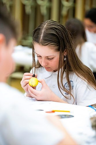 MIKAELA MACKENZIE / WINNIPEG FREE PRESS

Grade five student Veronika Shyndia, who arrived from Ukraine this December, makes a Pysanky egg at Immaculate Heart of Mary School in Winnipeg on Thursday, April 6, 2023. For Malak story.

Winnipeg Free Press 2023.