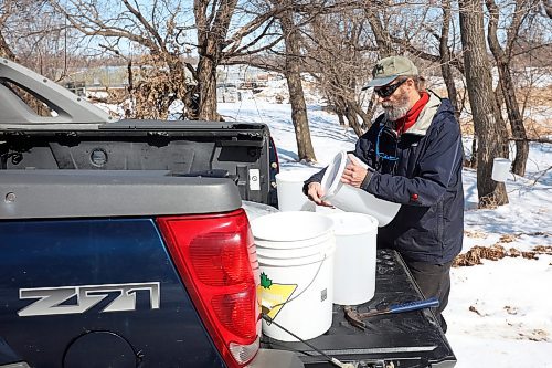 06042023
Dave Barnes taps maple trees to collect maple sap near his property and the Assiniboine Food Forest in Brandon’s east end on Thursday. Barnes has tapped over 200 trees this year to collect sap to make into maple syrup.
(Tim Smith/The Brandon Sun)