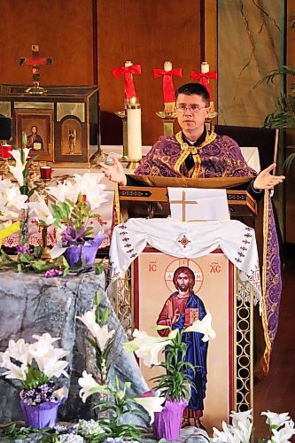 Rev. Father Yaroslav Strukhlyak conducts Good Friday service at St. Mary's Ukrainian Catholic Church in Brandon at the beginning of the Easter long weekend. (Kyle Darbyson/The Brandon Sun)