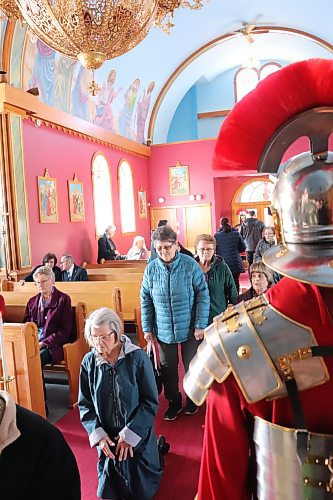 St. Mary's Ukrainian Catholic Church parishioners honour the holy shroud during Good Friday service in Brandon as Roman centurions look on. To commemorate the crucifixion and resurrection of Jesus Christ, St. Mary’s parishioners took turns guarding the church’s holy shroud in one-hour blocks throughout Friday and Saturday. (Kyle Darbyson/The Brandon Sun)
