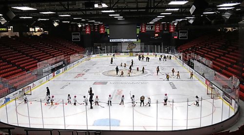 Young girls are shown going through drills at an Esso Fun Day Event at Westoba Place on Feb. 14, 2022. Girls hockey has grown enough in Brandon that a push is now being made for the city to have its own under-18 AAA female hockey team for the first time. (Perry Bergson/The Brandon Sun)