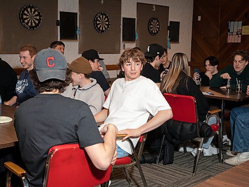 JESSICA LEE / WINNIPEG FREE PRESS

Zach Tinley (in white) is photographed with his friends Parker Lee (in black) and Ty Woods (in beige) on April 6, 2023 at Transcona Legion during Quizzlers, an enterprise run by husband and wife team James and Tara Higham. The Highams stage quiz nights for community groups and businesses all over the city.

Reporter: Dave Sanderson