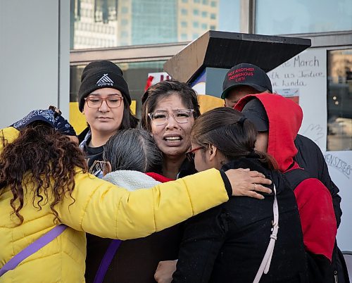 JESSICA LEE / WINNIPEG FREE PRESS

Supporters hug Linda Beardy&#x2019;s sister at police headquarters on April 7, 2023 after she almost collapses from grief. Hundreds gathered at Main and Portage for a rally to remember Linda Beardy&#x2019;s life. The rally ended with a march to police headquarters where protestors posted signs on the building demanding justice for Beardy and other missing and murdered women and girls. Beardy&#x2019;s body was found earlier this week on Monday at the Brady Landfill.

Reporter: Erik Pindera