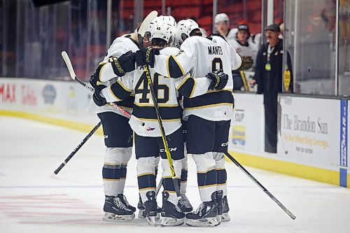 Dawson Pasternak (46) and Quinn Mantei (8) celebrate a Brandon Wheat Kings goal with their teammates. While there were some big moments for the club in the 2022-23 campaign, it will ultimately go down as a lost season for a club that didn't make the Western Hockey League playoffs. (Tim Smith/The Brandon Sun)