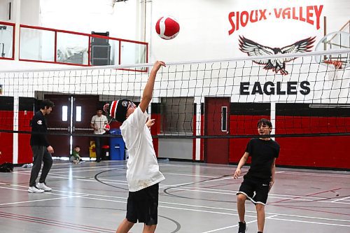 Youth from Sioux Valley Dakota Nation warm up for a game of volleyball at the community's elementary school Monday afternoon. (Kyle Darbyson/The Brandon Sun)